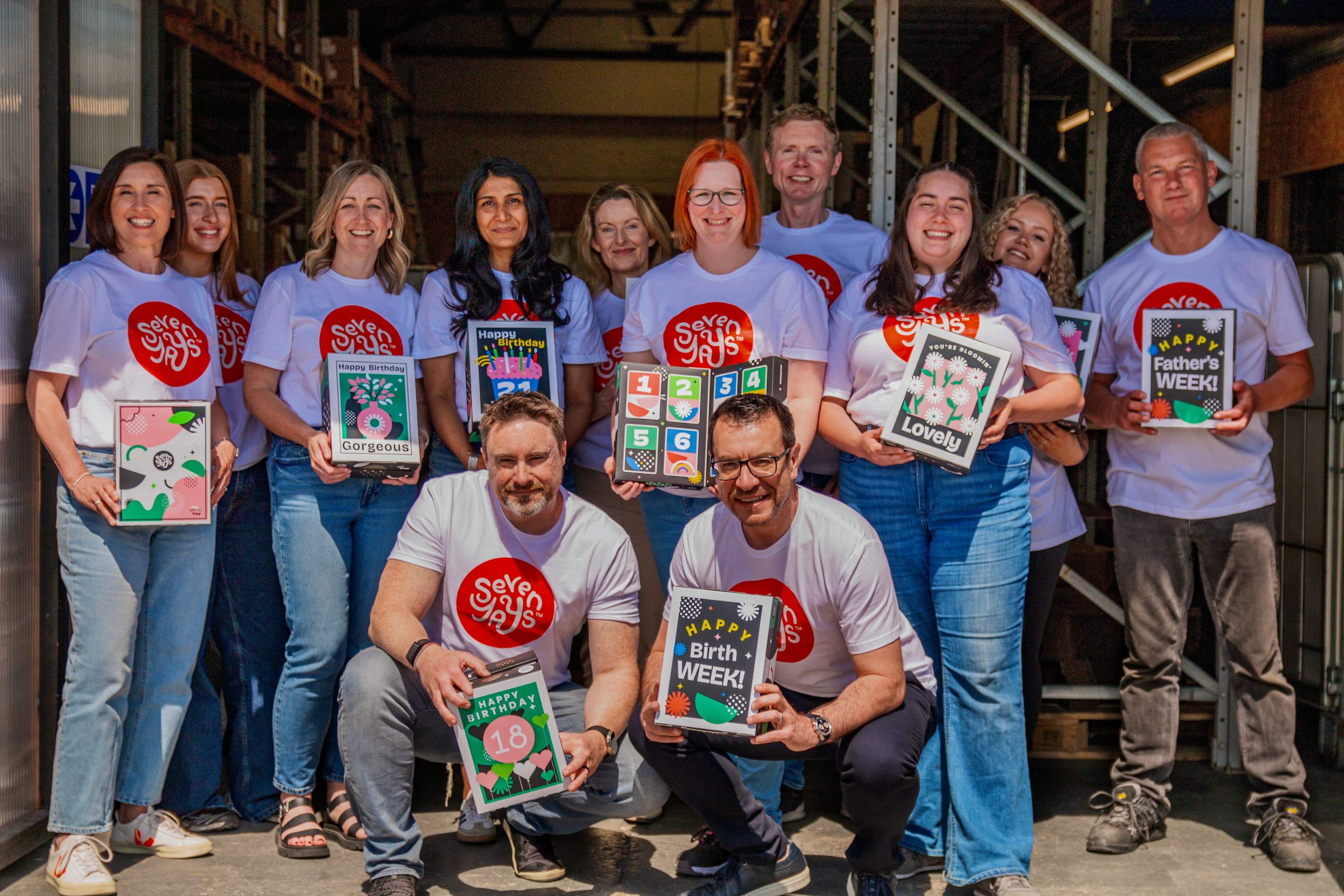 The Seven Yays team with a selection of gift boxes at the Liverpool warehouse
