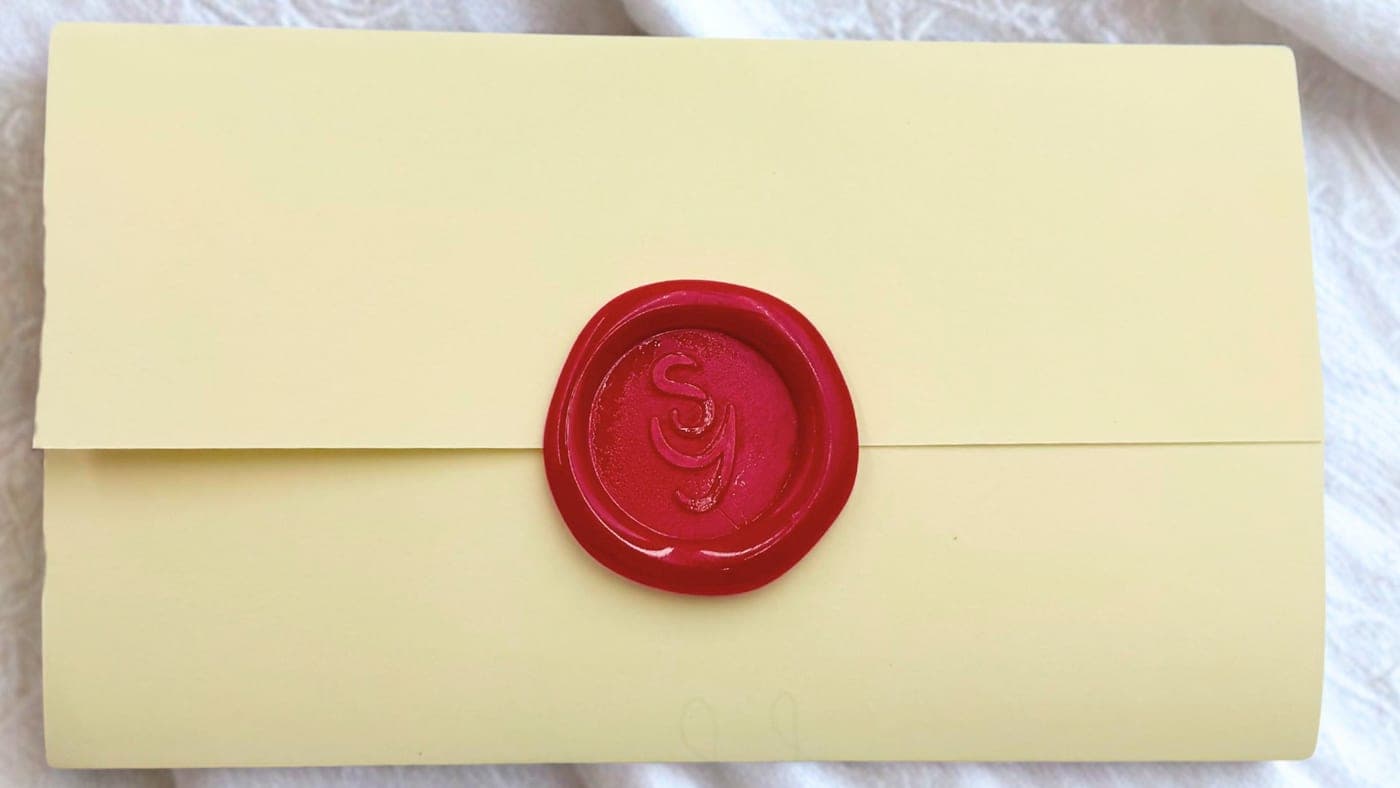 A message card and a box printed with a Do Not Open Until date