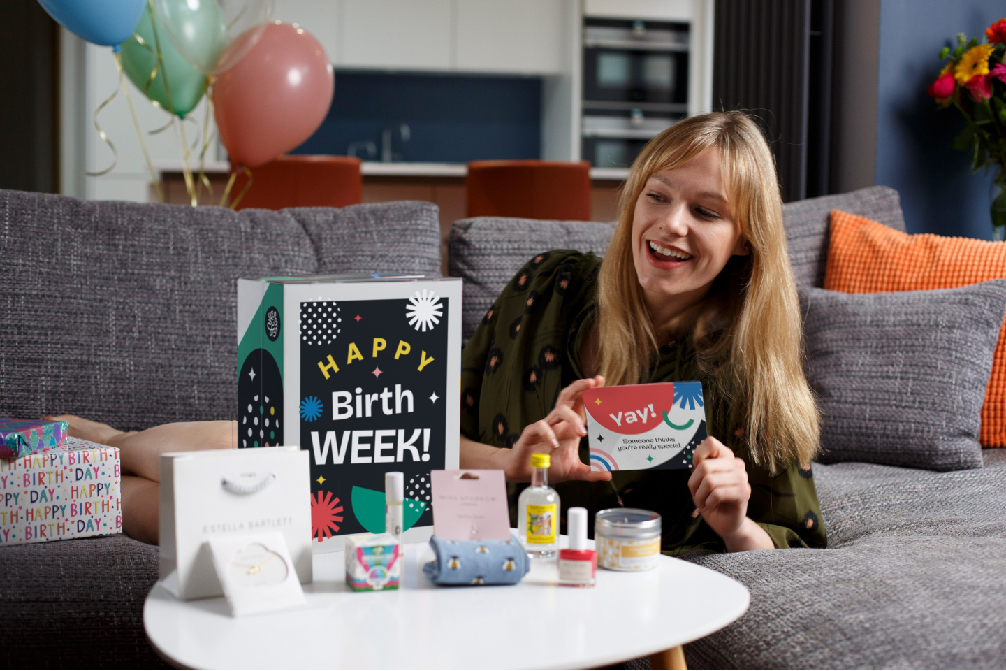 woman enjoying her birthday advent calendar